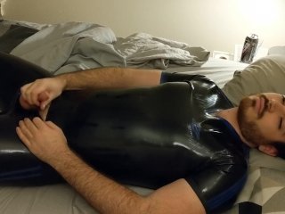 rubber boy unlocking and eating cum