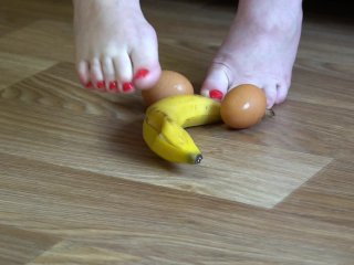 Fat legs bare feet mercilessly trampled banana and raw eggs. Crush Fetish.