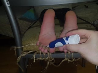 Mercilessly tickling toes and soles of my wife