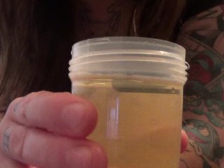 Young Elle Pisses In A Cup, Smells It, & Then Dumps It On Her Ass