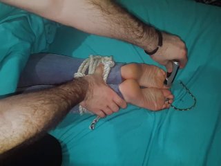 Tickle torture of wife's tied feet in bed