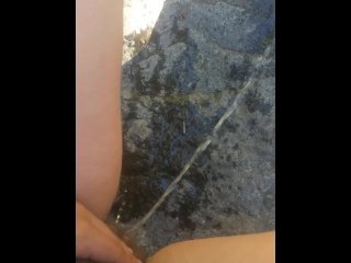 Long Pee Outside On Rock