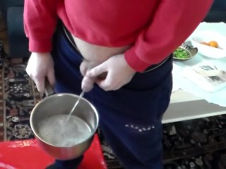 John is Peeing into a Kitchenpot