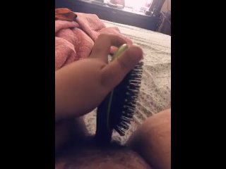 Horny slut spreads her legs to fuck her hairbrush