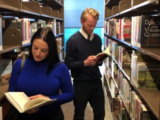 Angela White and I Read Quietly in a Library