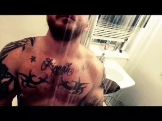 Fit guy taking a shower playing with cock