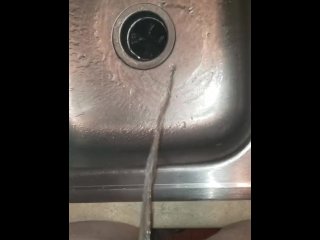 Girl Empties Full Bladder In Kitchen Sink