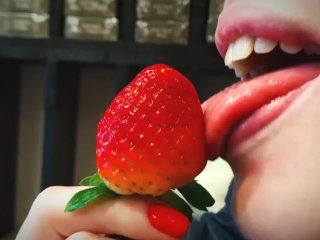 Sexy lips blonde licking strawberry in 4K