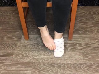 Student girl in white socks show foot and socks pov