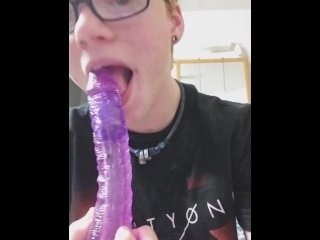 Trans guy training his throat with purple cock