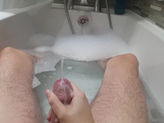 Stroking my hard cock in the bath and spurting cum
