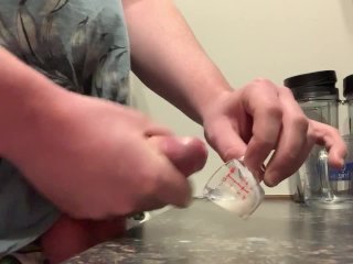 Cumming in a small measuring glass