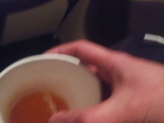 Pissing into a Mc Cup