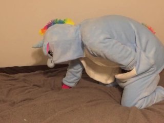 Spanking in unicorn onesie with ridding crop 