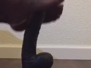 Jerking off dildo playing with cum