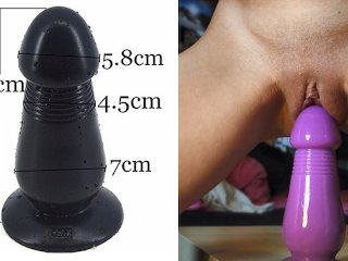 HD clouse-up of a very big purple dildo inside a teen pussy