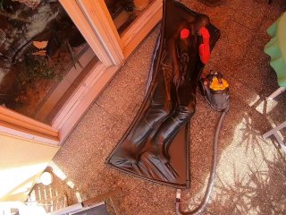 Cyborg get in Vacbed - with inflatable heavy rubber suit in Vacbed