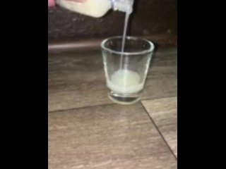 dipping my dick into a shot glass full of my own cum that I froze and thawed 1