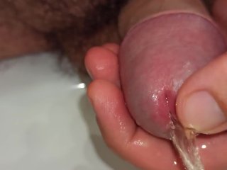 close up pissing and playing with peehole