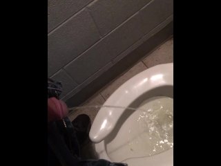 slave peeing in public toilet