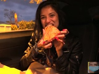 Snacking On Pizza In The Car