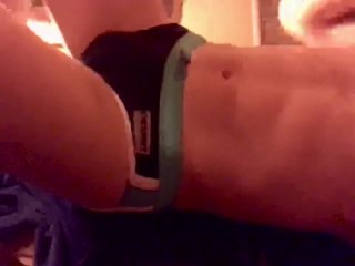 Twink flexing abs in sauna in swim trunks 