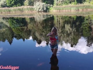 Girl in glasses blowing bubbles on the river. Full clip in Fan Club