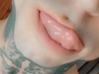 Horny tattooed guy licking his lips