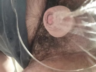 Close up of uncut cock with foreskin. Pov under a glass