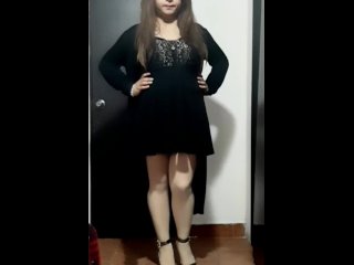 Cute crossdresser wearing dress and heels 