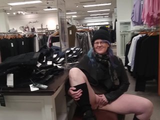 milf rubs pussy in busy clothing store