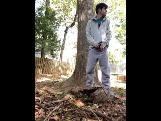  jerking off behind a tree in his backyard