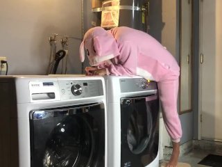 Bunny onesie humps dryer while doing laundry