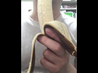 Peel and eat a large, black banana by hand.