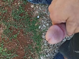Alpha man pissing in nature