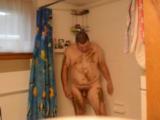 Getting cleaned up in the shower after getting very muddy and dirty -st