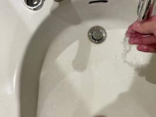 Peeing on bathroom sink