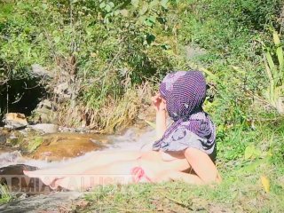 Shameless Muslim slut topless in hijab Smoking in nature