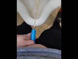 Girl uses shewee to piss in urinal