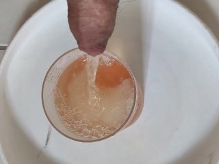 Piss into a cup of shaved ice