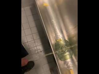 Pissing all over public urinal