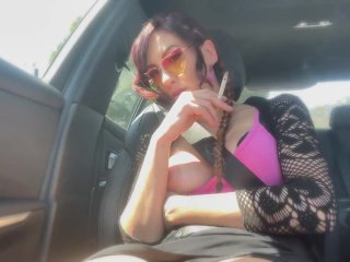 Car ride: Artemisia Love smoking with her big nipples out