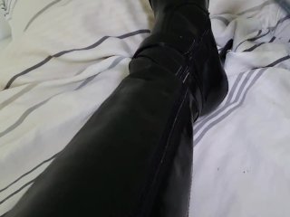 Whip spanking on leather boots