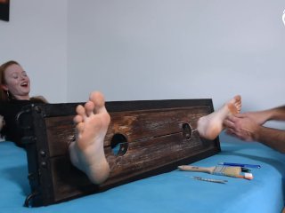 Merciless tickling of her BIG bare feet (foot tickling, stocks, big feet, bare soles, foot torture)