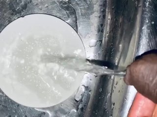 Quality uncut dick is pissing on a source in the room sink 