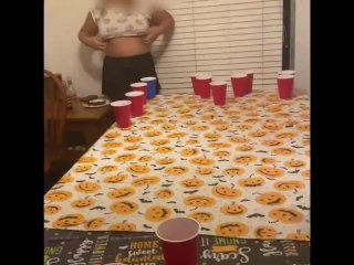 Playing pong and she flashes to distract