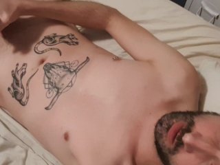 Bearded tattooed guy wanking