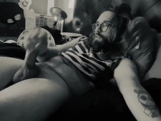 Bearded Daddy with glasses strokes thick cock