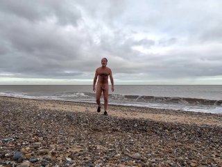 Naturist Naked in Nature. Winter walk on the beach.