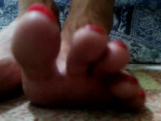 Red long toenails teasing